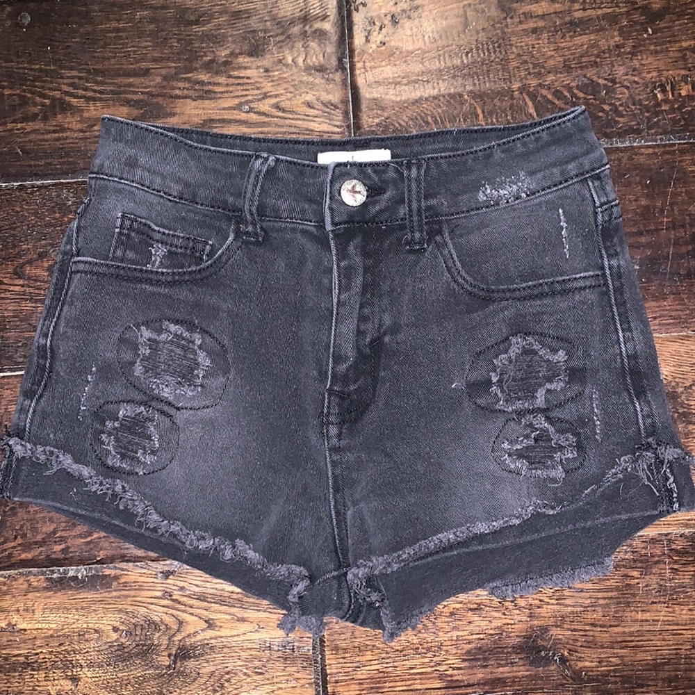 Black distressed jean shorts